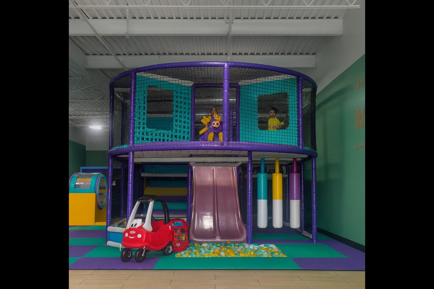 The slides and climbing play rig at 518 Play Academy