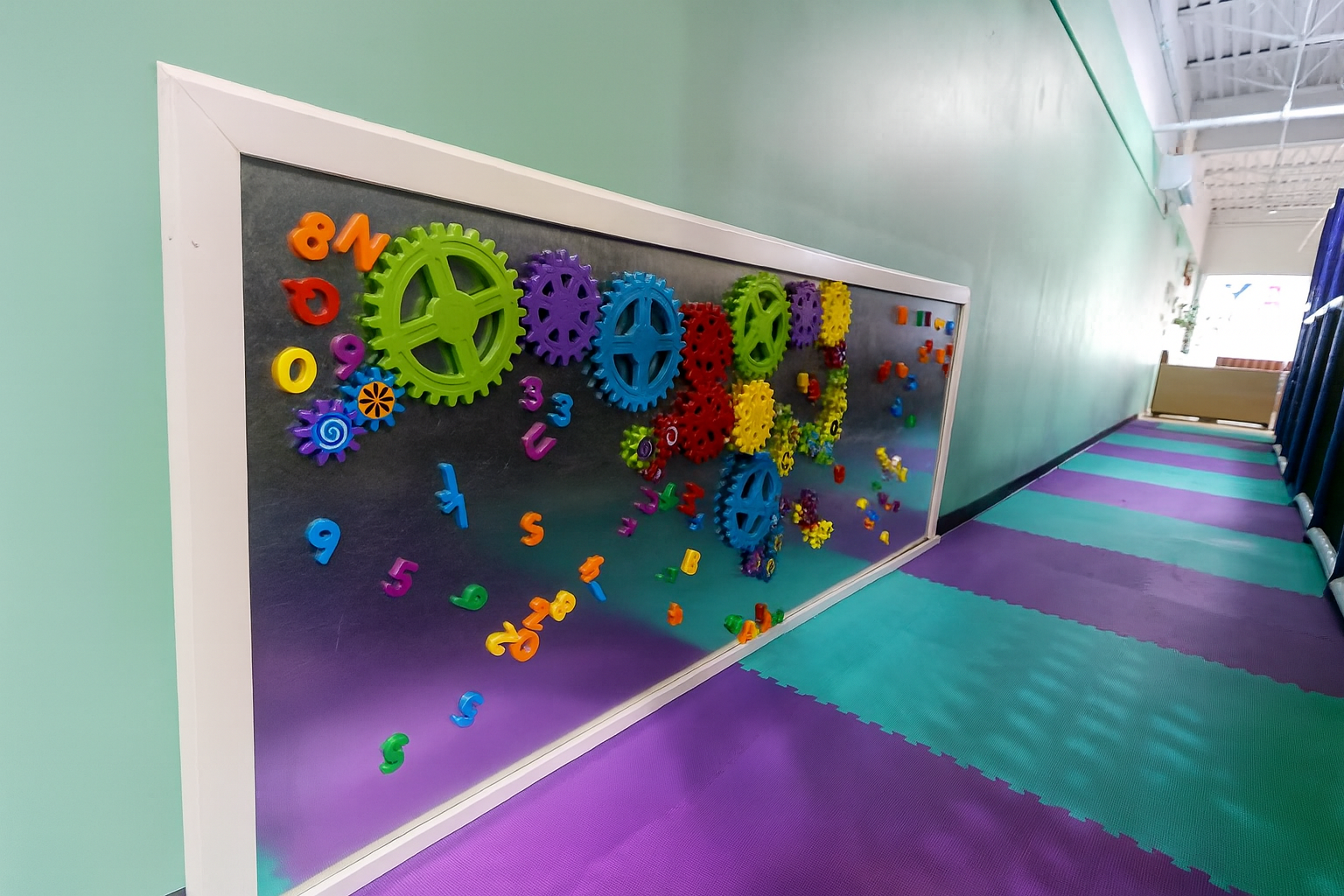 Magnet Gear Wall - Build and tinker with magnetic gears for STEM play.